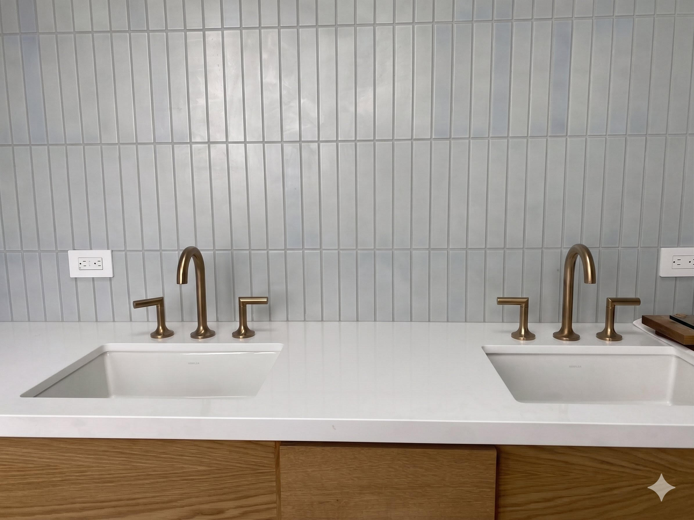 Bathroom vanity remodel with brass faucet
